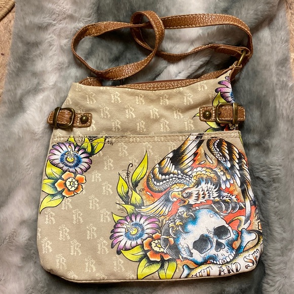 Marc Ecko Handbags - Ecko crossbody with painted rock detailing and red interior